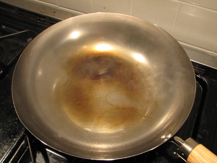 When Cheaper is Better: How to Season a Wok