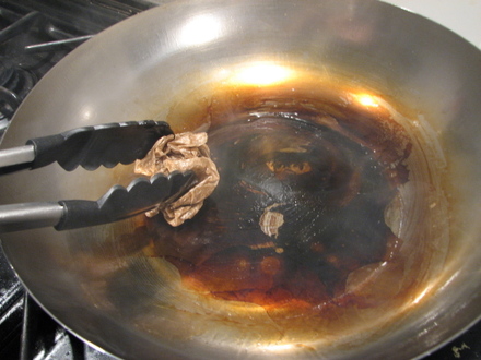 When Cheaper is Better: How to Season a Wok