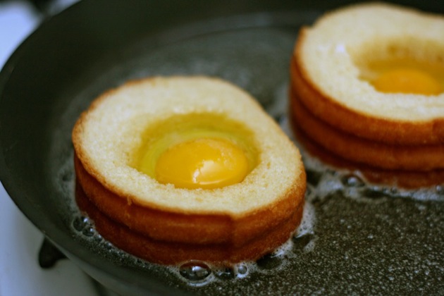 egg in a basket in a pan